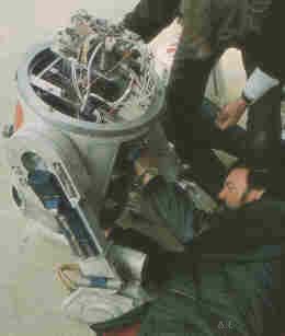 Two techs working on R5-D4 in tunisia